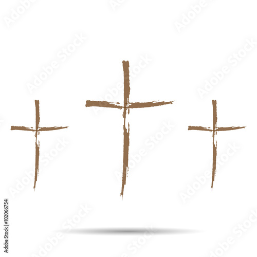Three brown cross with shadow