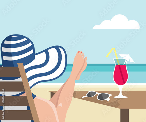 Girl, relaxing on the beach, drinking cocktail 