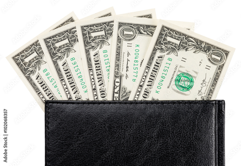 Part of the office notebook and dollar banknotes Part of the office notebook and dollar banknotes
