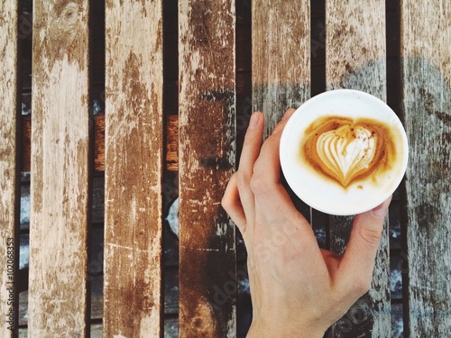 Coffee cup takeaway on wood table