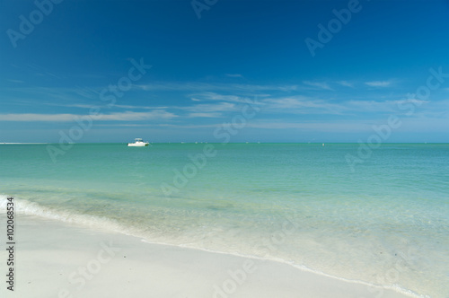beautiful beach with boat in ocean, Florida, USA 