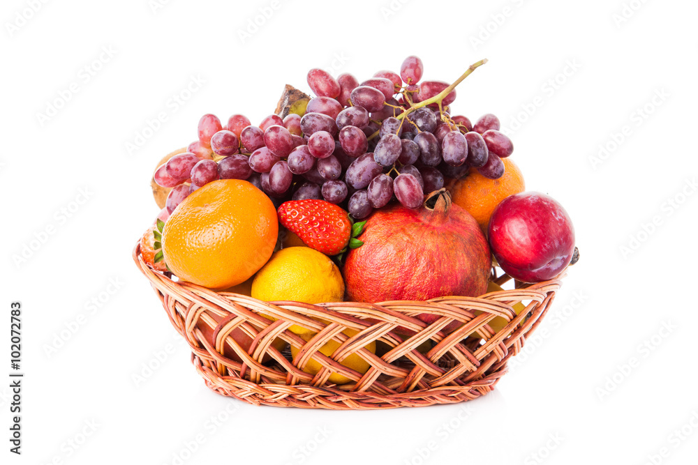 Fruits  in the basket. assorted fruits in wicker basket