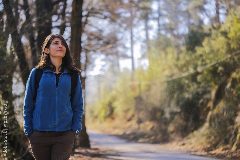 Happy young woman on road trip. Happy young woman on road trip.