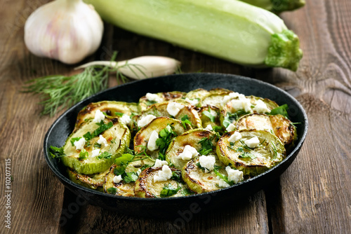 Cooked zucchini with herbs