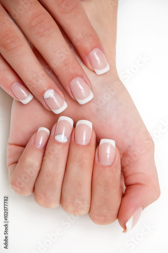 classic French manicure with a dedicated ring finger