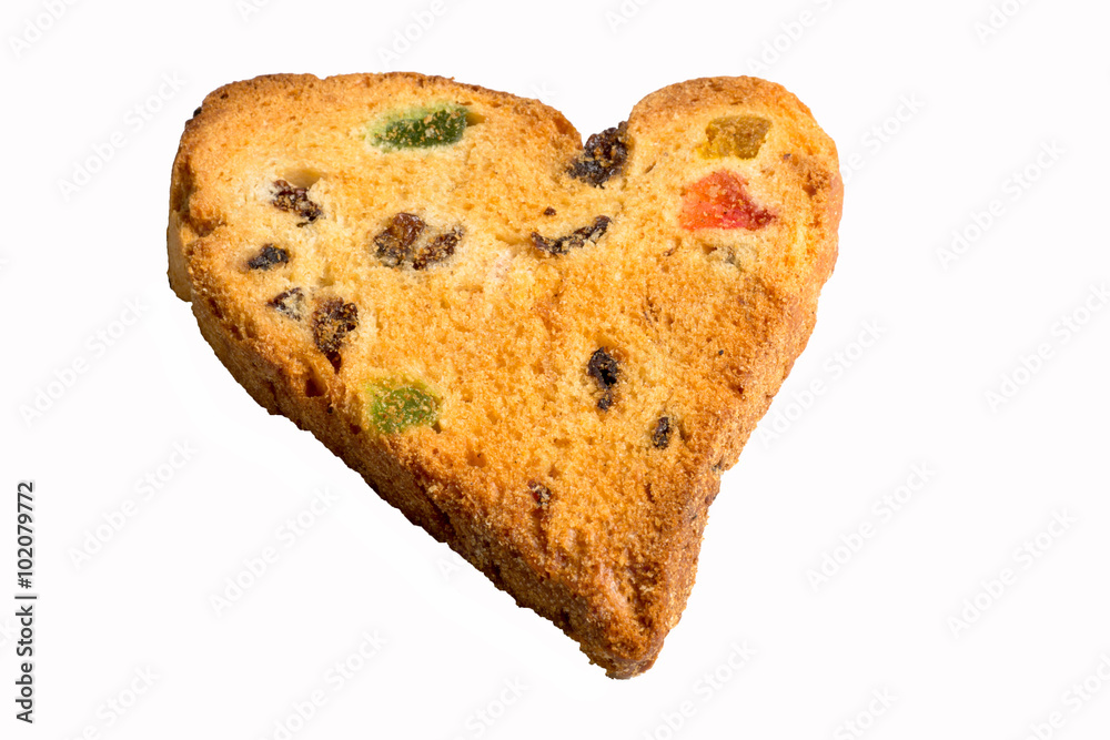 cookies with raisins and candied fruit in the shape of a heart isolated on a white background cookies with raisins and candied fruit in the shape of a heart isolated on a white background