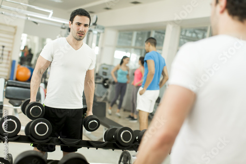 Young man training in the gym