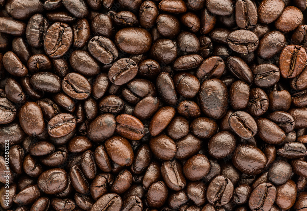 Naklejka premium background of brown coffee beans