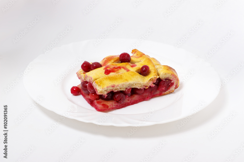 Delicious cherry pie on a white background. Delicious cherry pie on a white background.
