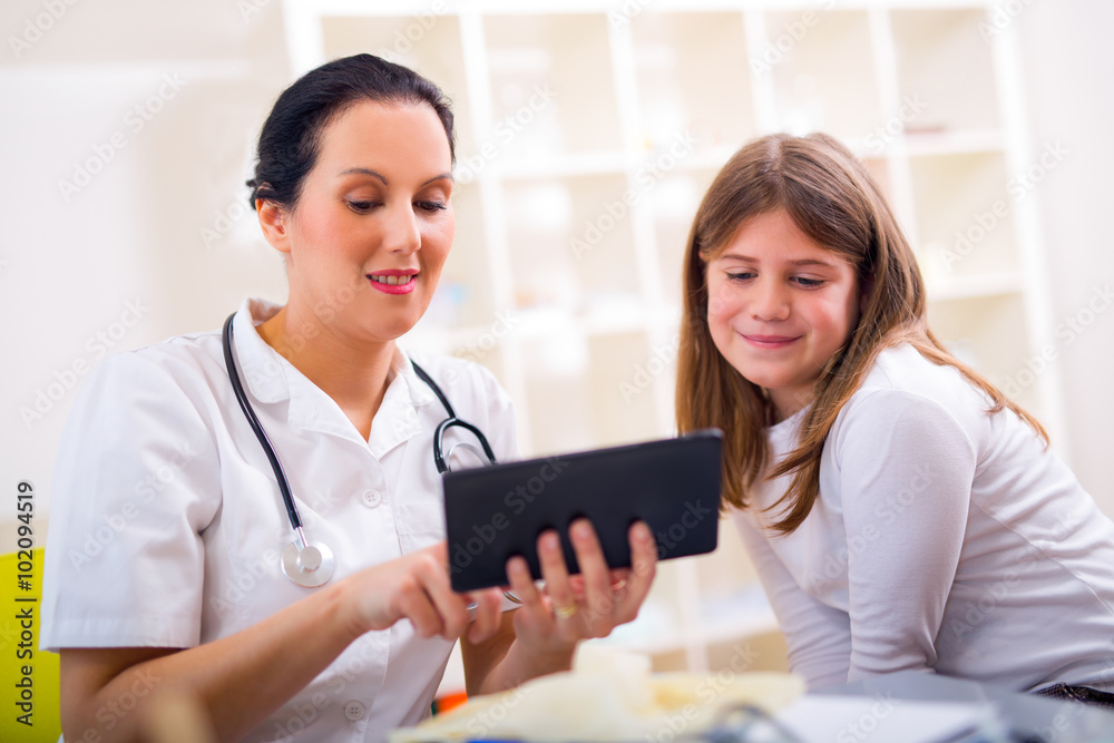Female doctor and little girl patient. Medical examination. Female doctor and little girl patient. Medical examination.