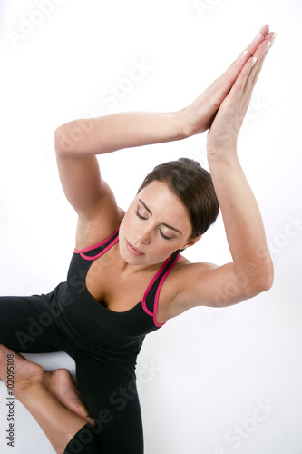 Stretched High Woman Raises her Arms During Seated Meditation