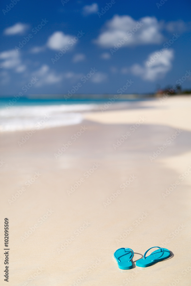 Flip flops on a tropical beach