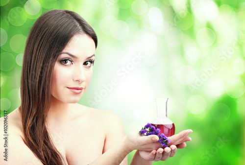 Beautiful young woman on gr...