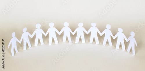 Paper people doing teamwork in their business