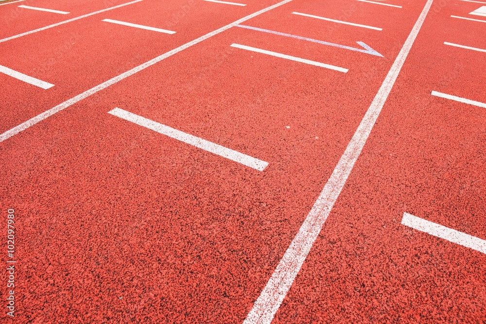 Start. Red running racetrack on the outdoor athletic stadium Start. Red running racetrack on the outdoor athletic stadium