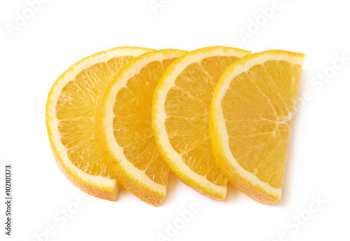 Stack of orange fruit slices isolated