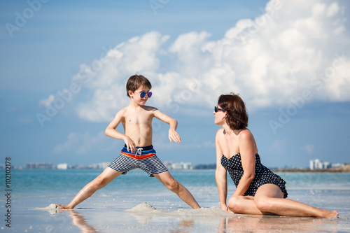 Mother and son on tropical beach in Florida
