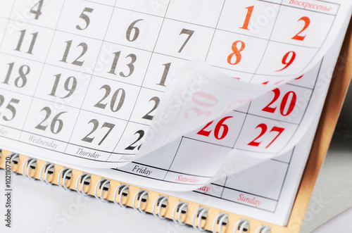 Closeup of dates on calendar page