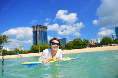 海でボディーボードをしている女性 photo