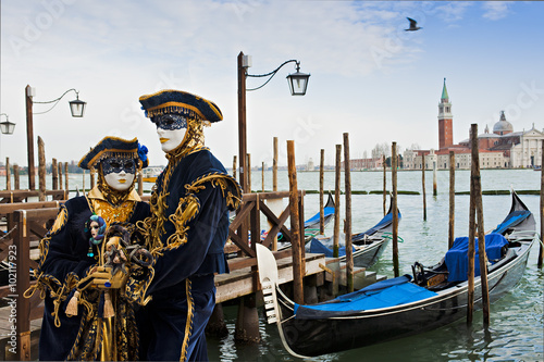 Couple in carnival mask in Venice. © dianacrestan