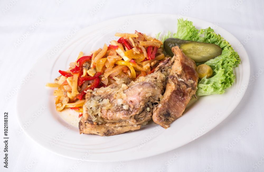 Baked pork meat with warm vegetable salad. Baked pork meat with warm vegetable salad.