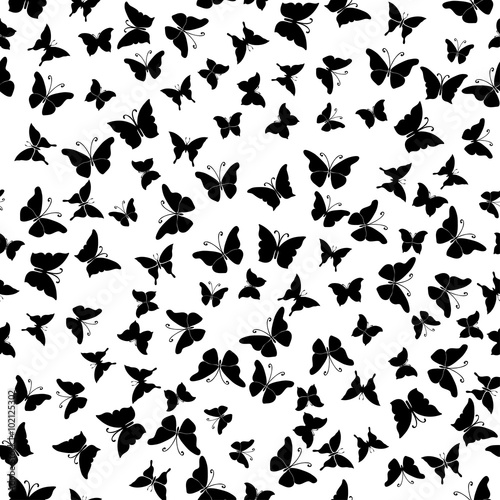 Seamless pattern with silhouettes of butterflies