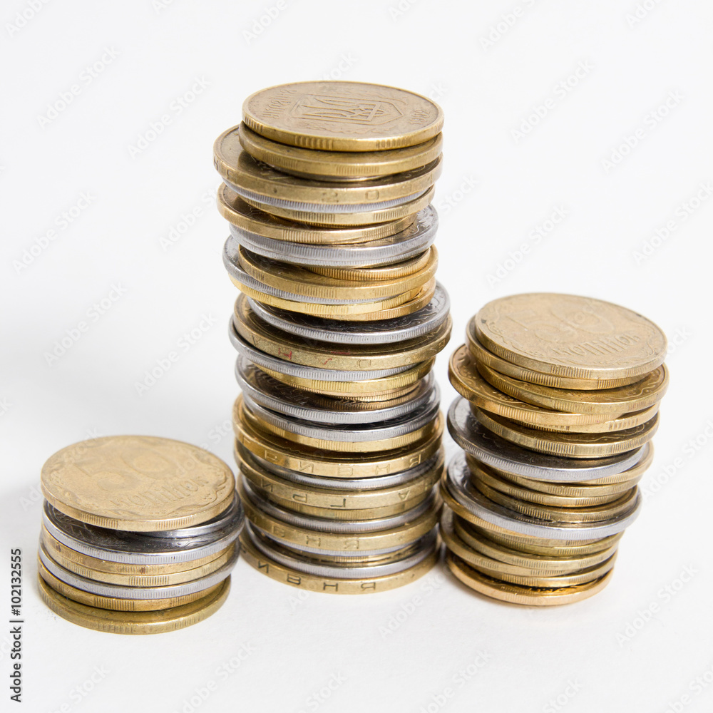 Columns of golden and silver coins isolated on white background. Money concept, investment bank Columns of golden and silver coins isolated on white background. Money concept, investment bank