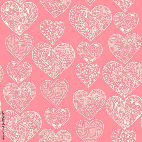 Seamless white hearts vertical pattern on pink background