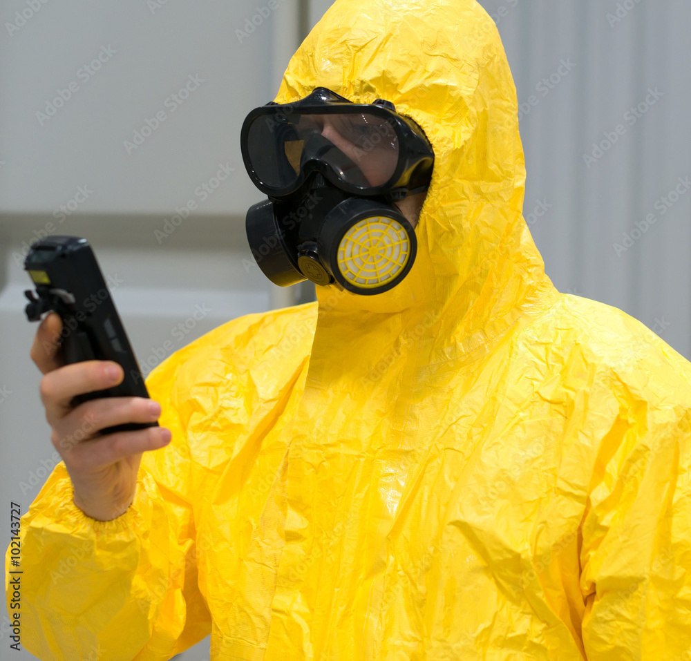 Doctor with anti radiation suit during washing with jets of wate Stock  Photo by ©ChiccoDodiFC 47200459