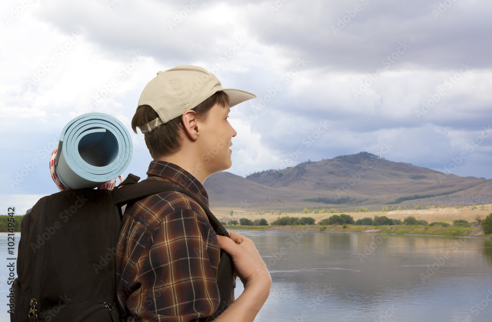 Man with a travel backpack