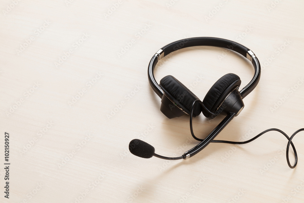 Office desk with headset. Call center support Office desk with headset. Call center support