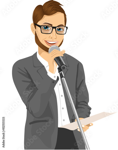 man speaking into a microphone