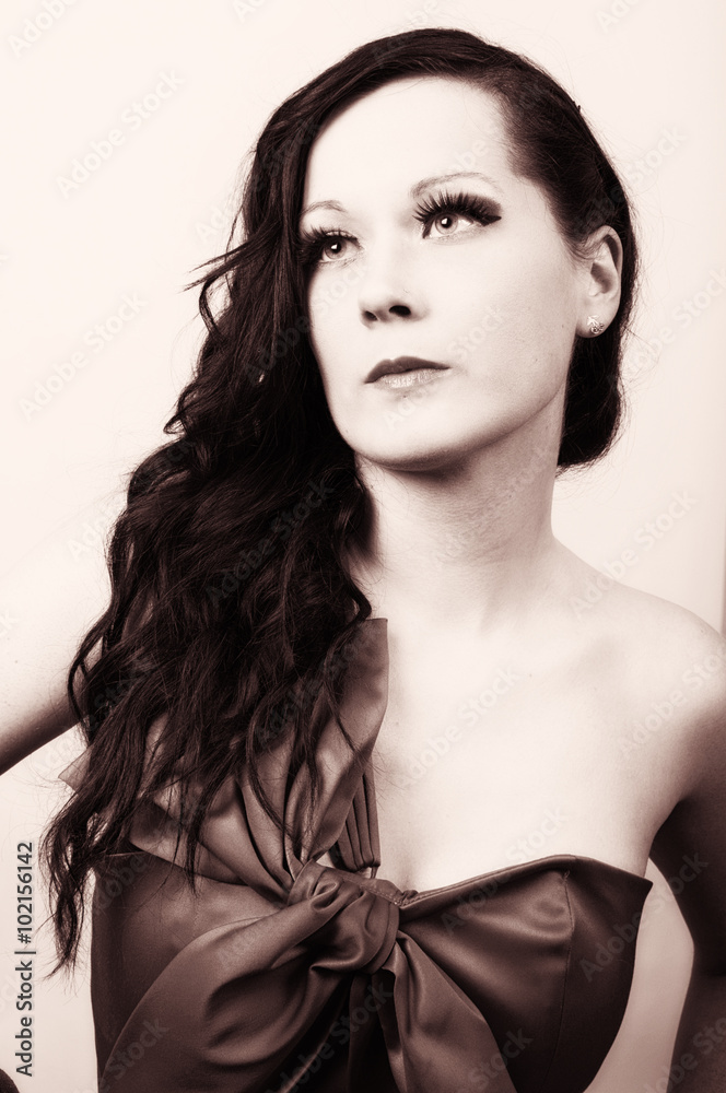 Copper toned Shot of a Confident Young Woman . Plain Wall with Copper toned Shot of a Confident Young Woman . Plain Wall with