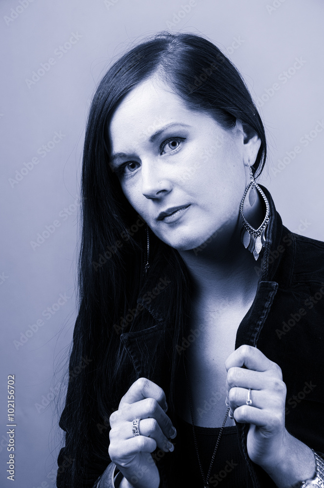 Obraz premium Cool blue toned Shot of a Confident Young Woman . With Copy Spa