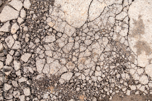 Detailed macro cracked tarmac, road surface.