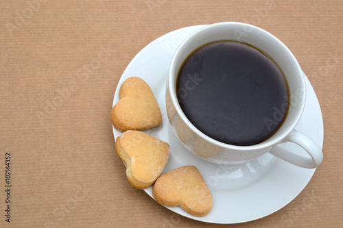 Coffee cup and cookies