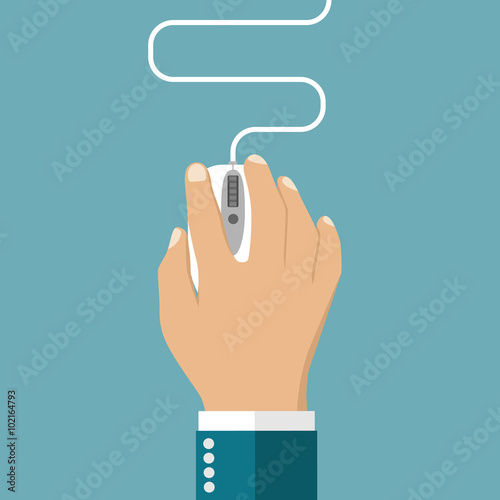 Hand on computer mouse.