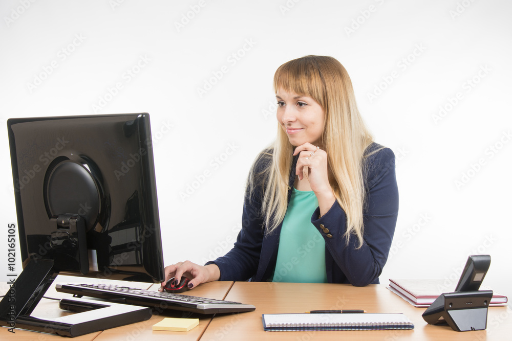 Office a specialist working at the computer in the office Office a specialist working at the computer in the office