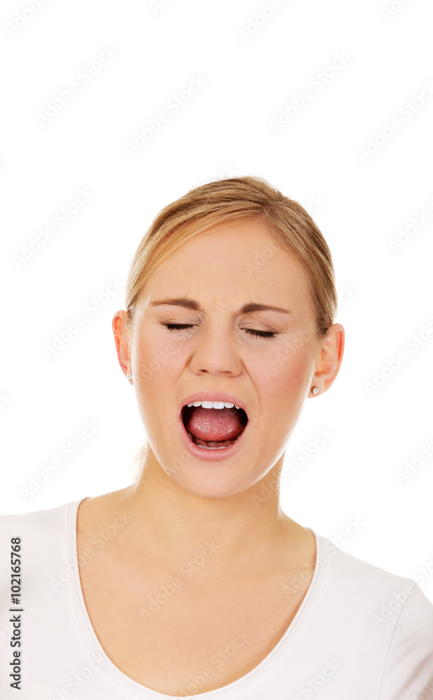 Stressed or angry young woman screaming