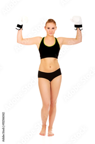 Boxing fitness woman wearing white boxing gloves