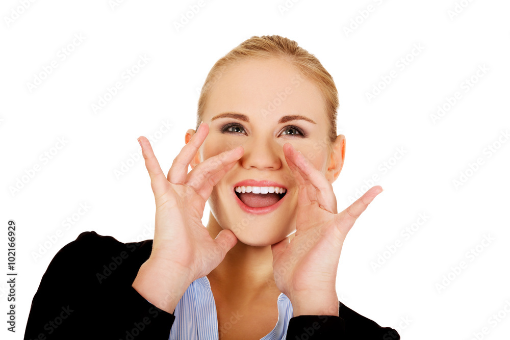 Young smiling business woman screaming loud or calling someone Young smiling business woman screaming loud or calling someone