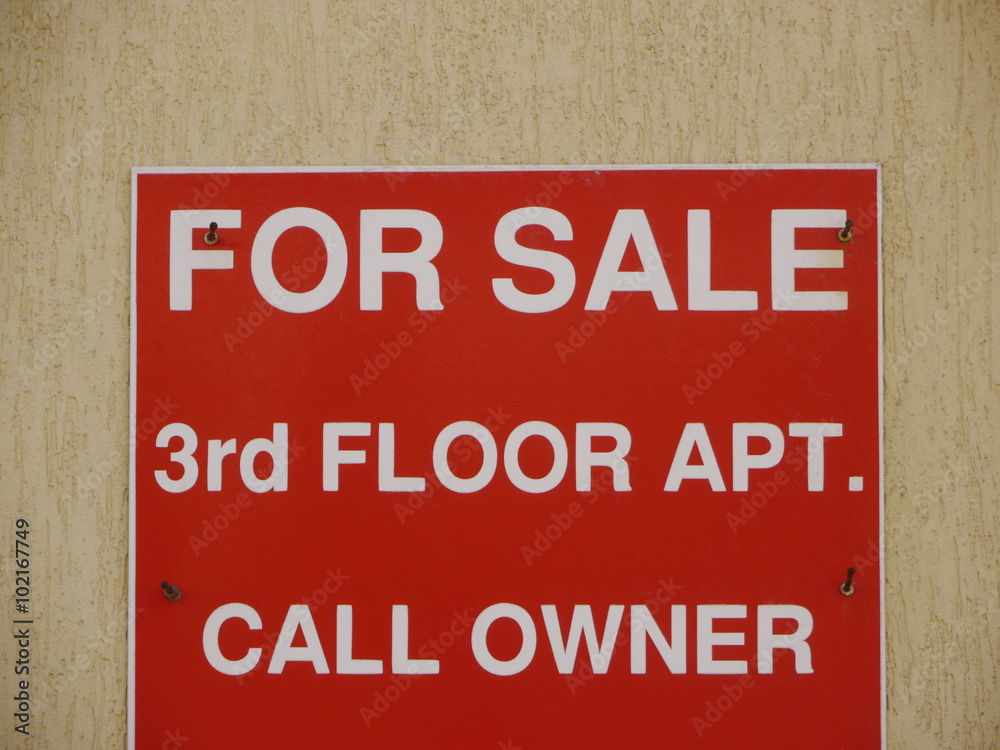 red sign with white letters red sign with white letters