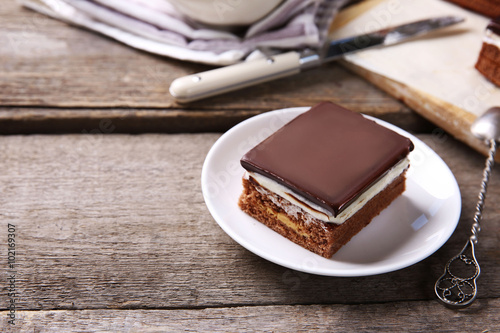 Delicious chocolate brownies on wooden background