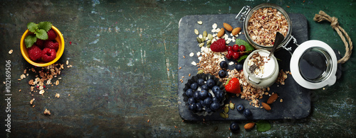 Healthy breakfast of muesli  berries with yogurt and seeds