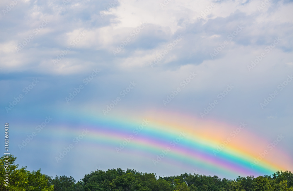 Blue sky and rainbow Blue sky and rainbow