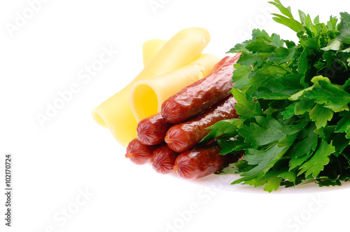 sausages with cheese and parsley on a plate