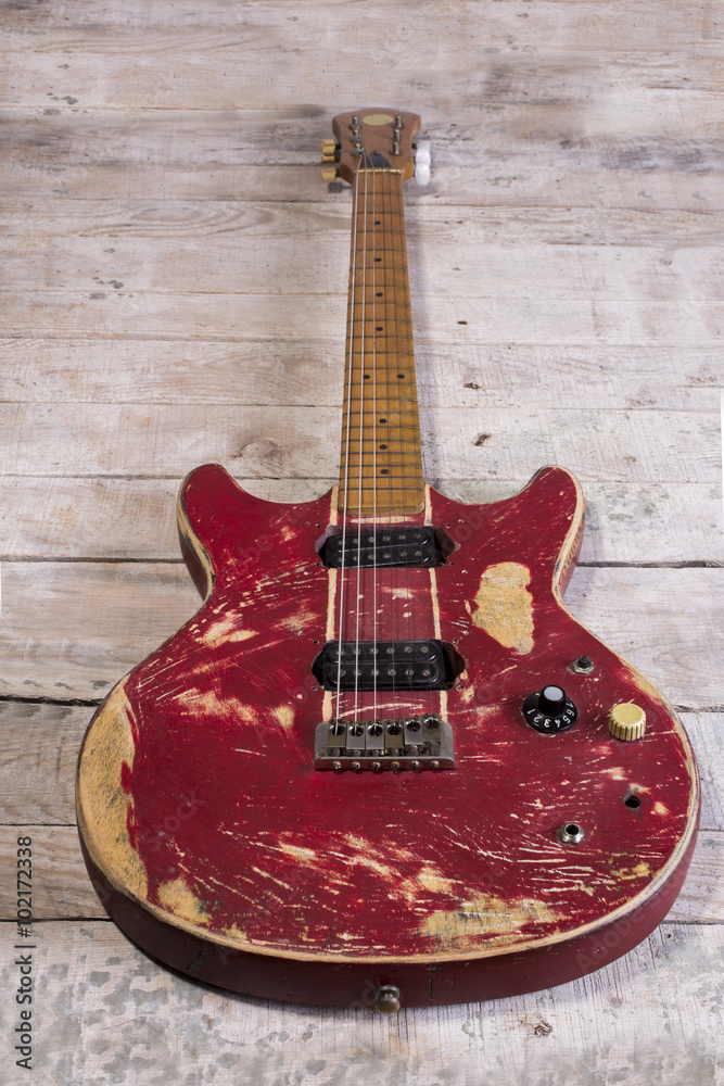 old  electric guitar red