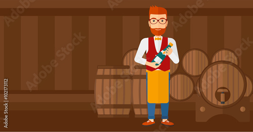 Waiter holding bottle of wine.