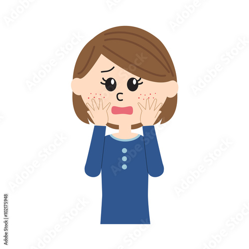A devastated young woman with pimples on her cheek