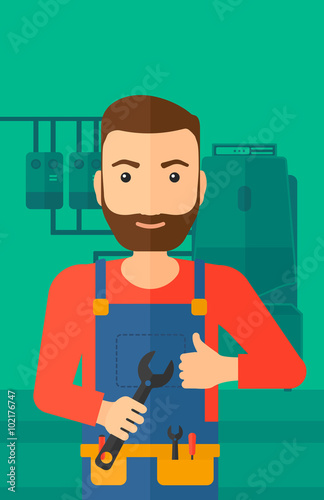 Cheerful repairer with spanner.